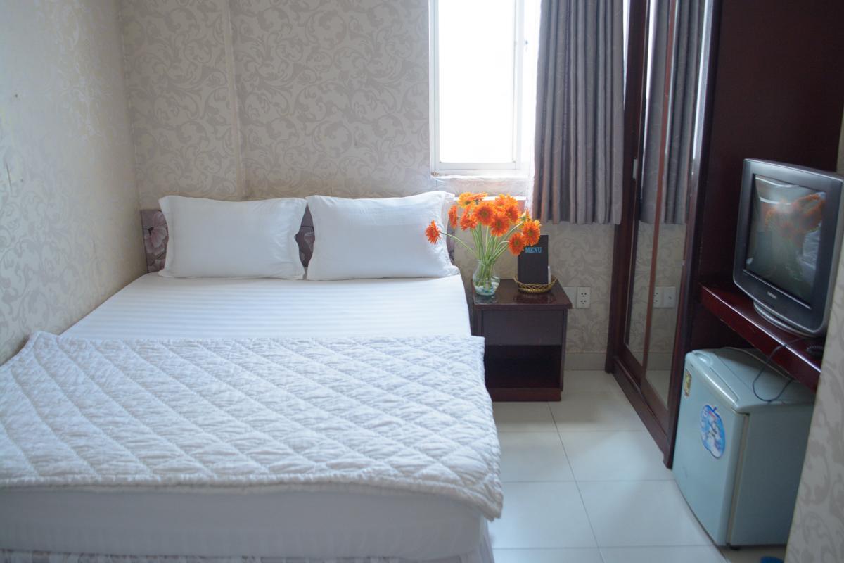 Lucky Hotel Ho Chi Minh-stad Buitenkant foto
