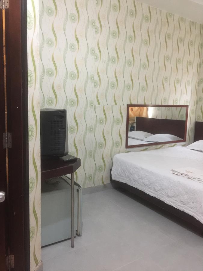 Lucky Hotel Ho Chi Minh-stad Buitenkant foto