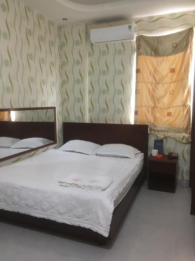 Lucky Hotel Ho Chi Minh-stad Buitenkant foto