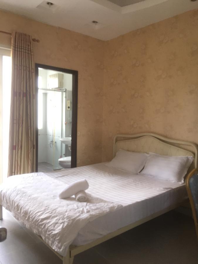 Lucky Hotel Ho Chi Minh-stad Buitenkant foto