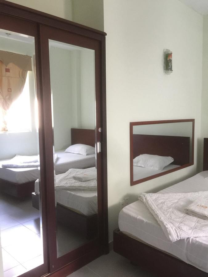 Lucky Hotel Ho Chi Minh-stad Buitenkant foto