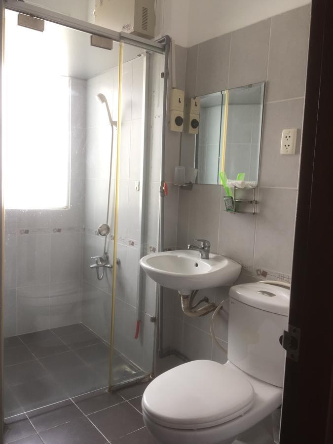 Lucky Hotel Ho Chi Minh-stad Buitenkant foto